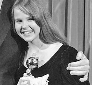 Linda Blair con un globo de Oro